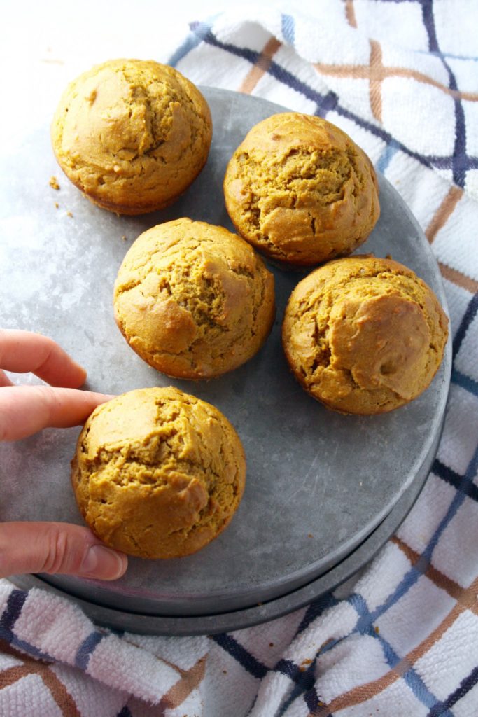these super soft whole wheat pumpkin muffins have just a hint of sweetness making them perfect for breakfast or as a healthy snack! // cait's plate