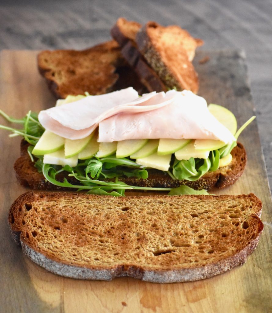 cheddar, apple & arugula turkey sandwich - a perfect lunch for the fall season // cait's plate