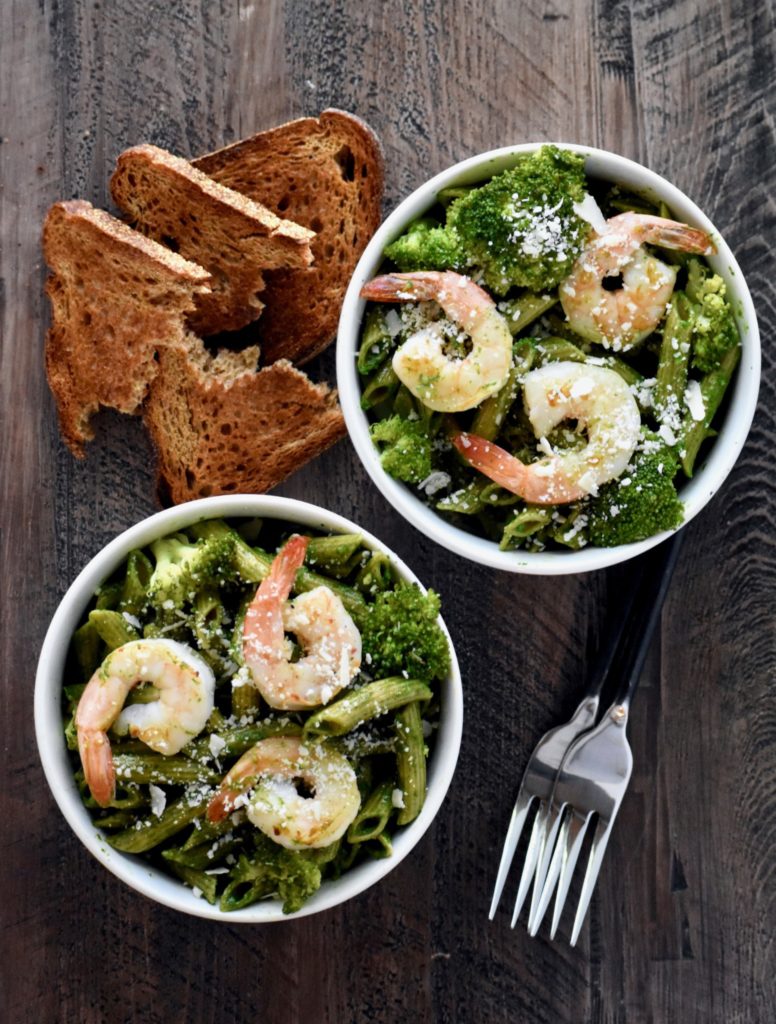 shrimp and spinach walnut pesto over whole wheat penne - a hearty, satisfying meal that can be made in 15 minutes start to finish! // cait's plate