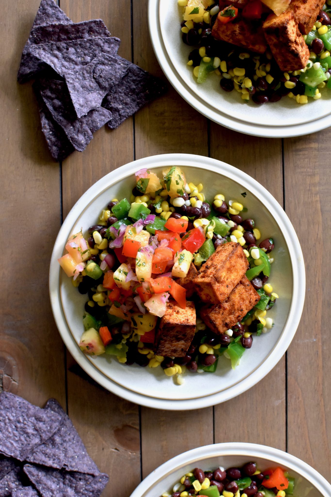 chili-spiced tofu bowl with pepper lime corn and pineapple salsa // cait's plate